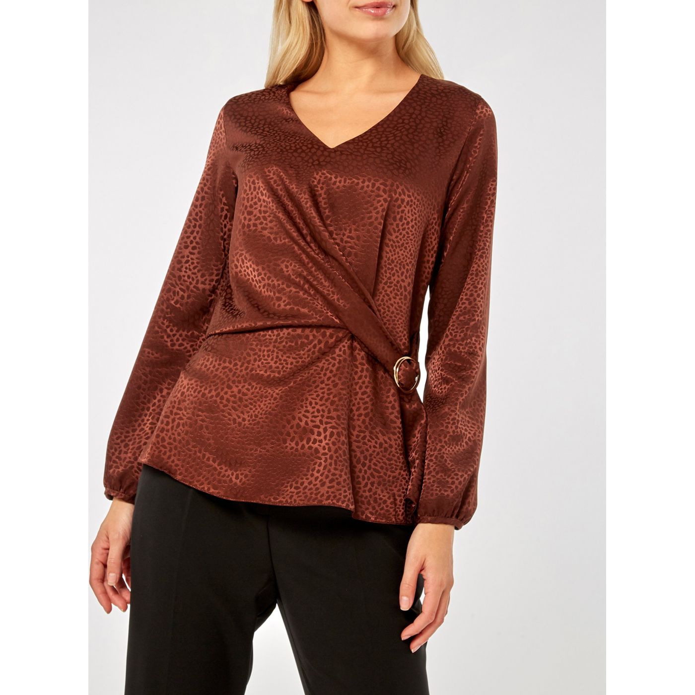 Brown patterned blouse with decorative Dorothy Perkins clasp