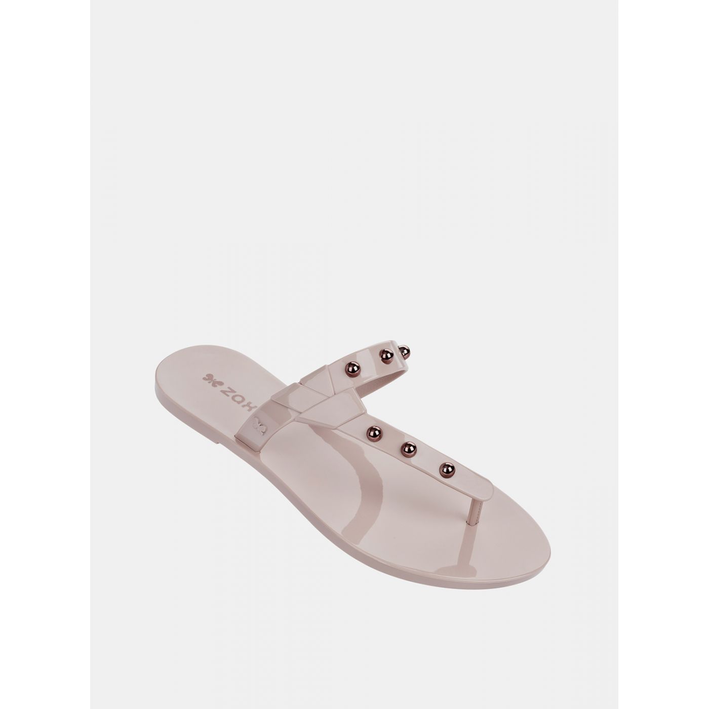 Pale pink flip-flops with zaxy spike pink-gold details