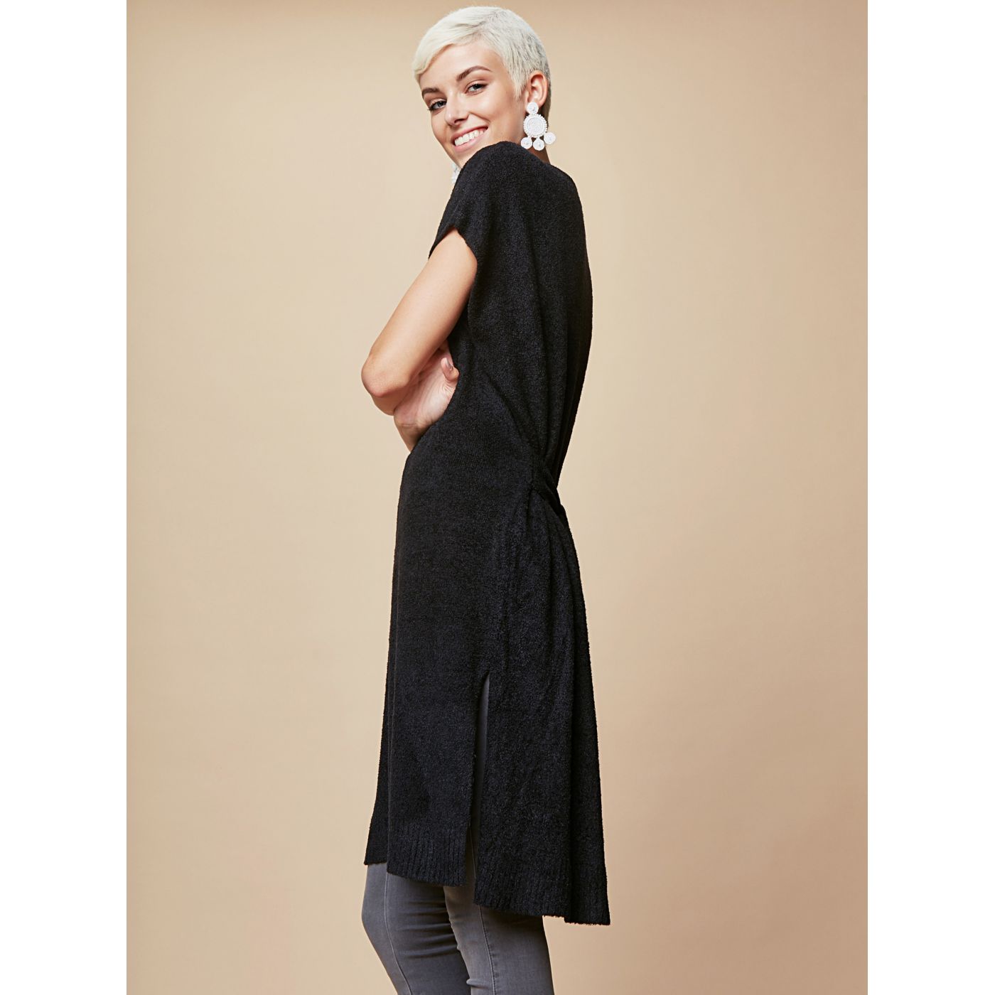Black sweater dress with touch me binding.
