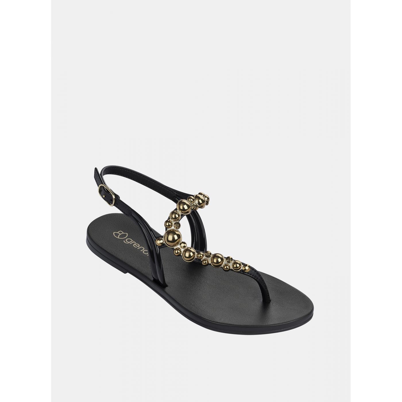 Black sandals with details in grendha gold