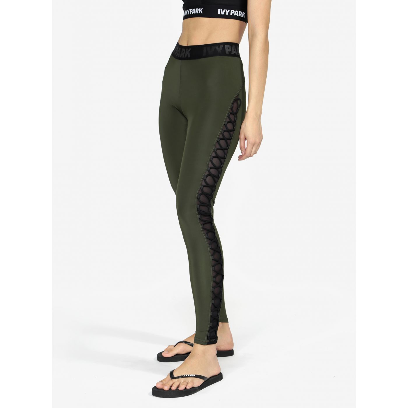 Green leggings with Ivy Park lacing