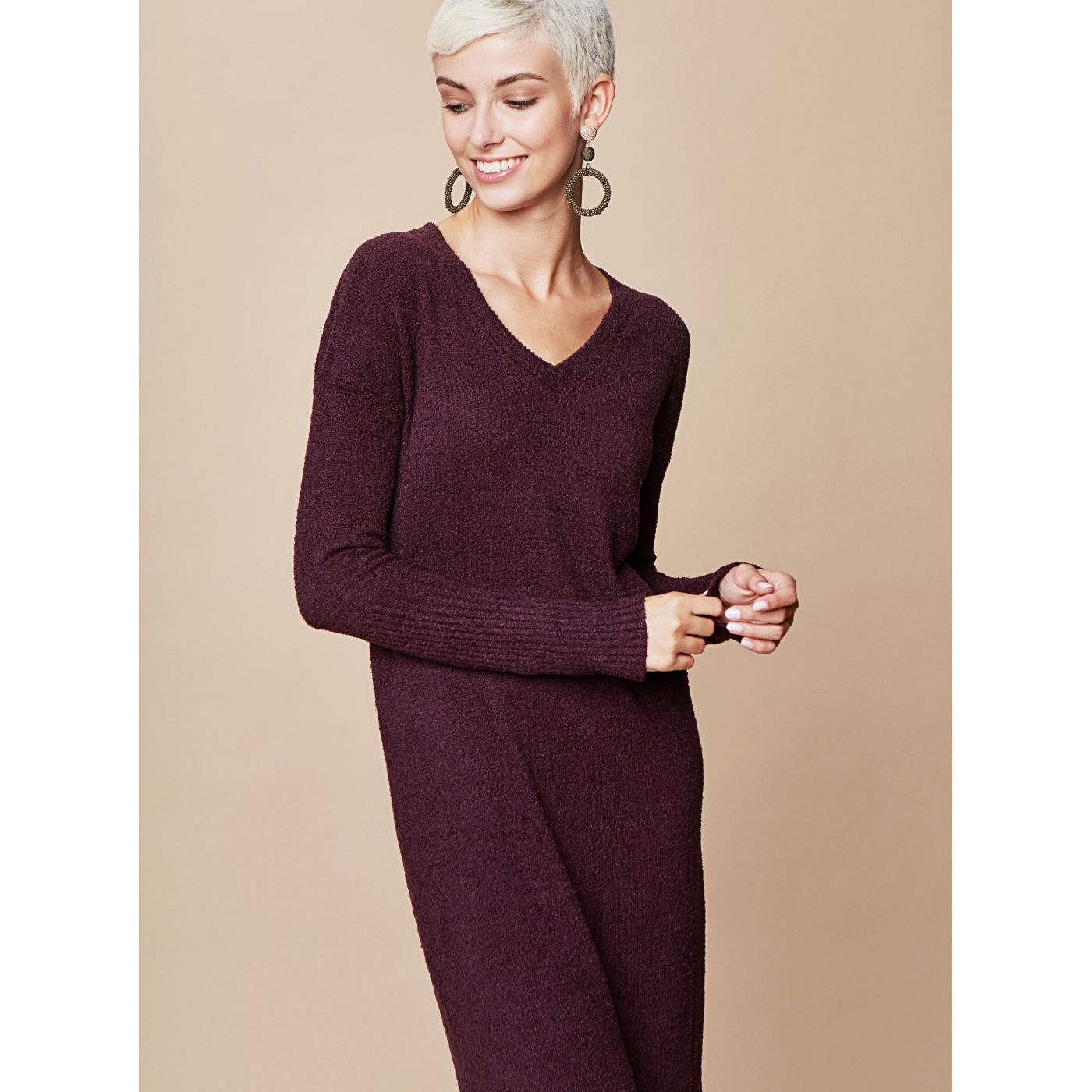 Dark purple sweater dress with v-neck and touch me tie.