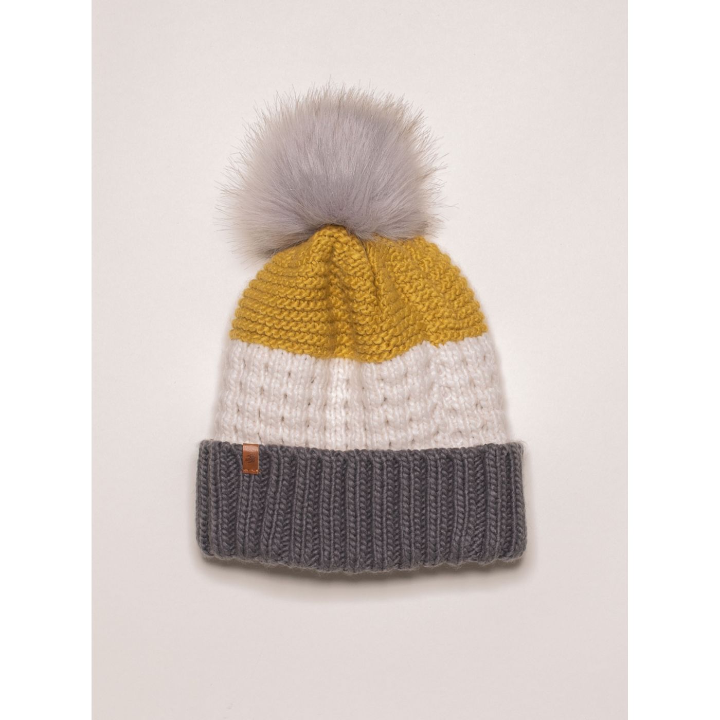 Cream striped cap with Brakeburn pompom