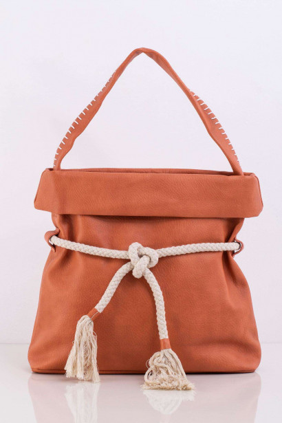 Orange ladies bag with a tie