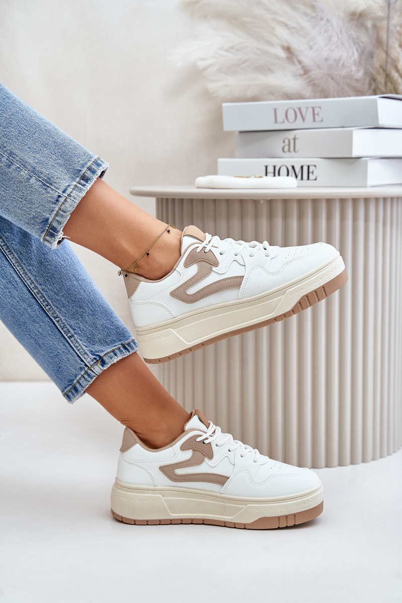 Women's sneakers made of eco-leather on a white-beige platform Henizore
