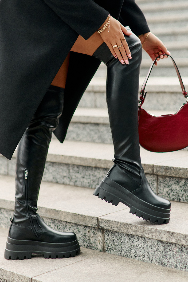 Over-the-knee boots on a massive platform black zinera