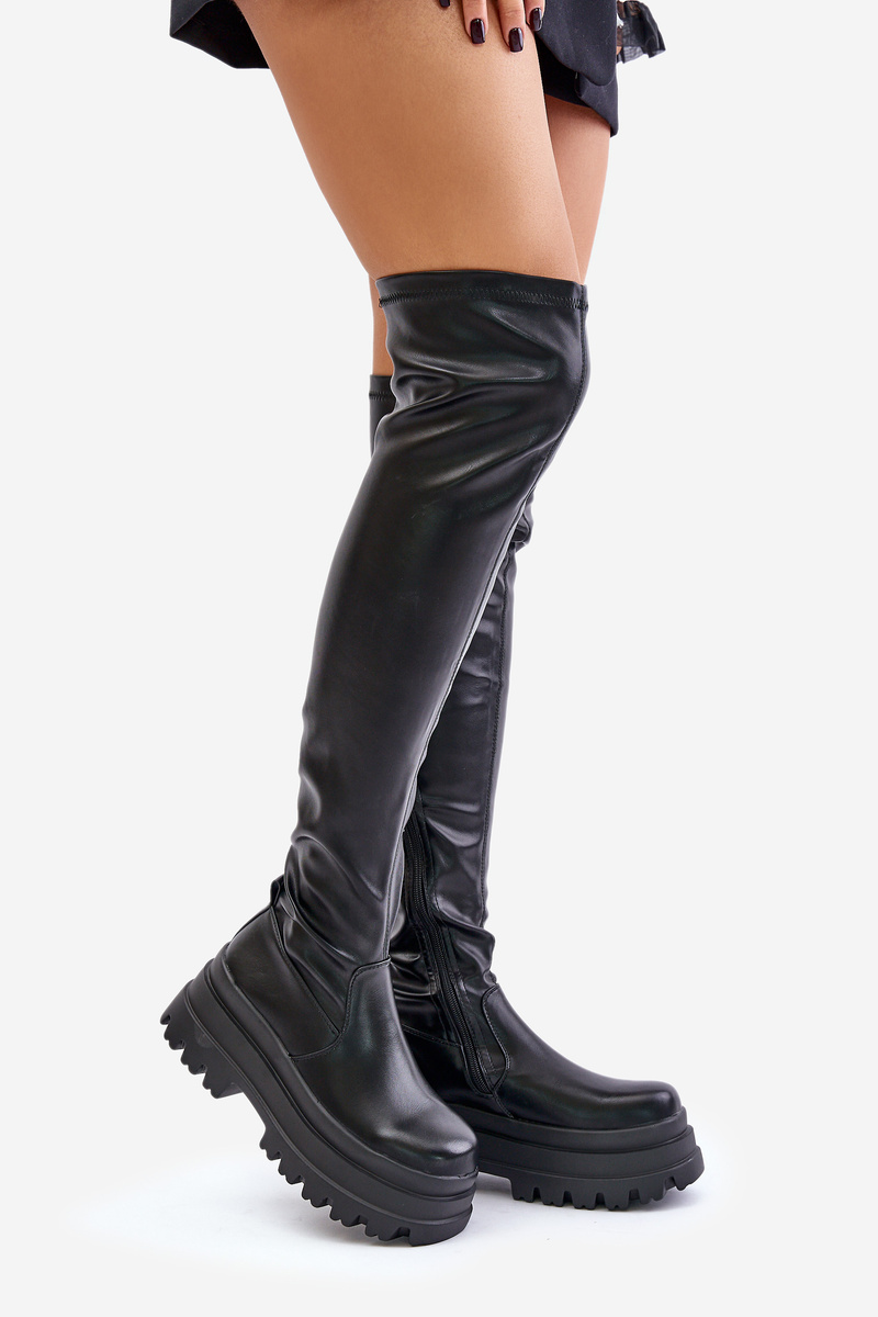 Over-the-knee boots on a massive platform black zinera