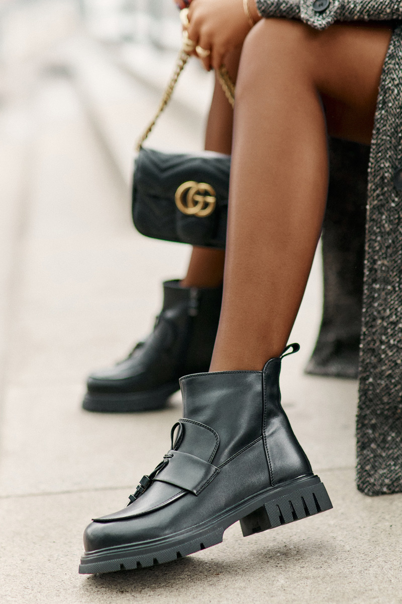 Leather ankle boots on a flat heel with a black insulated black Asperra decoration