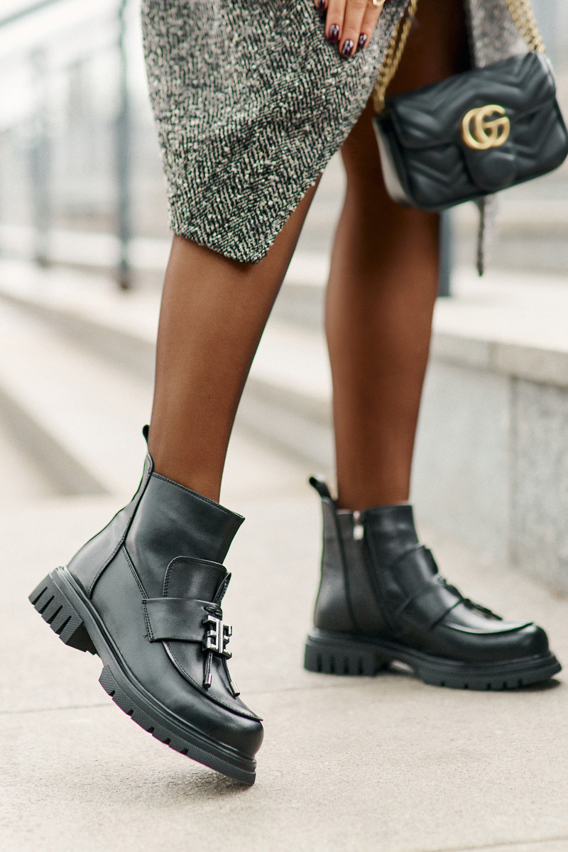 Leather ankle boots on a flat heel with a black insulated black Asperra decoration