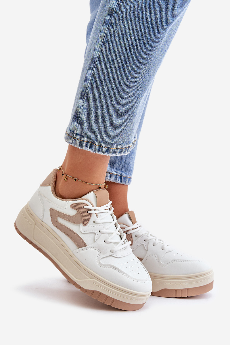 Women's sneakers made of eco-leather on a white-beige platform Henizore