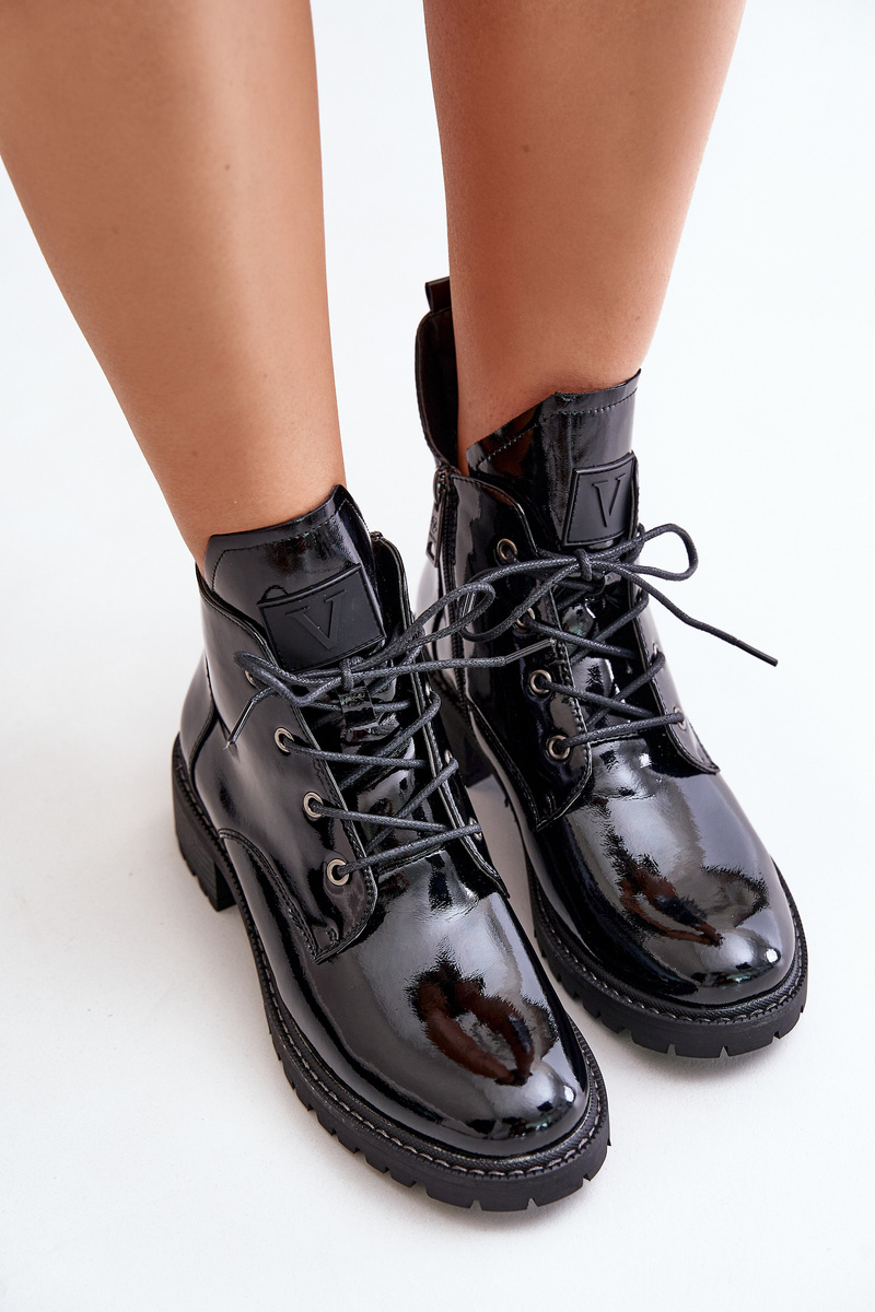 Insulated women's ankle boots on a low heel lacquered Vinceza black