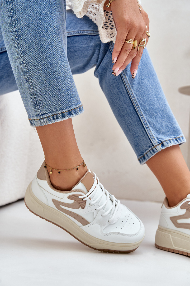 Women's sneakers made of eco-leather on a white-beige platform Henizore