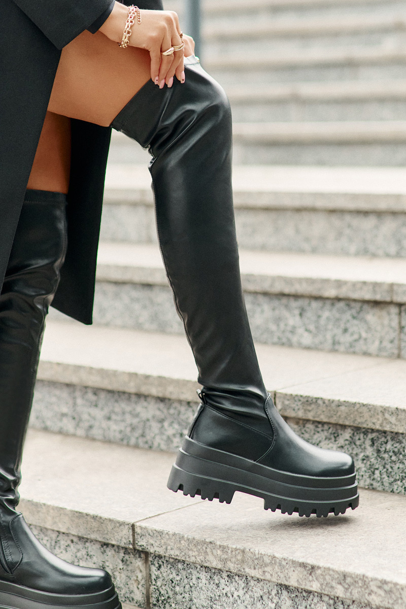 Over-the-knee boots on a massive platform black zinera