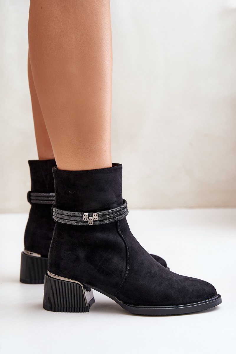 Insulated women&#039;s ankle boots on a low heel with decorative straps D&amp;A black