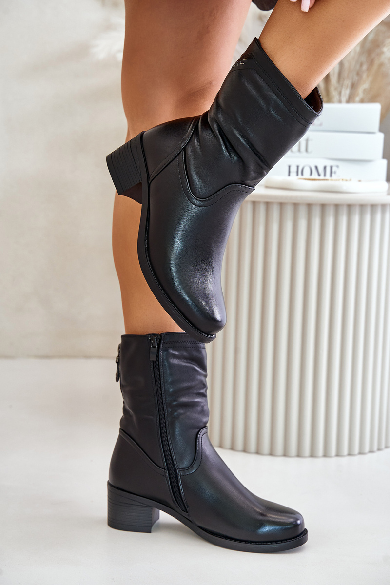 Ankle boots on a low heel insulated with fur Vinceza black