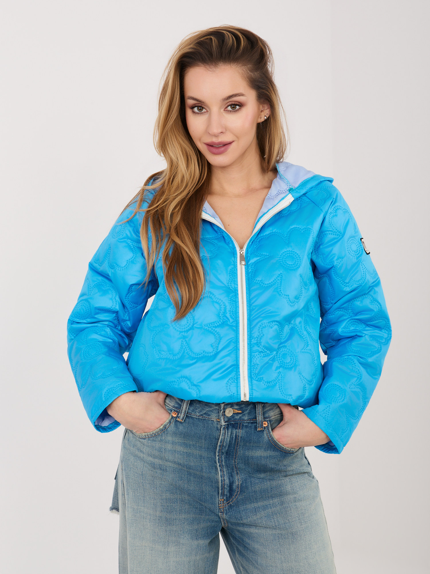 Синьо дамско яке с флорален капитон