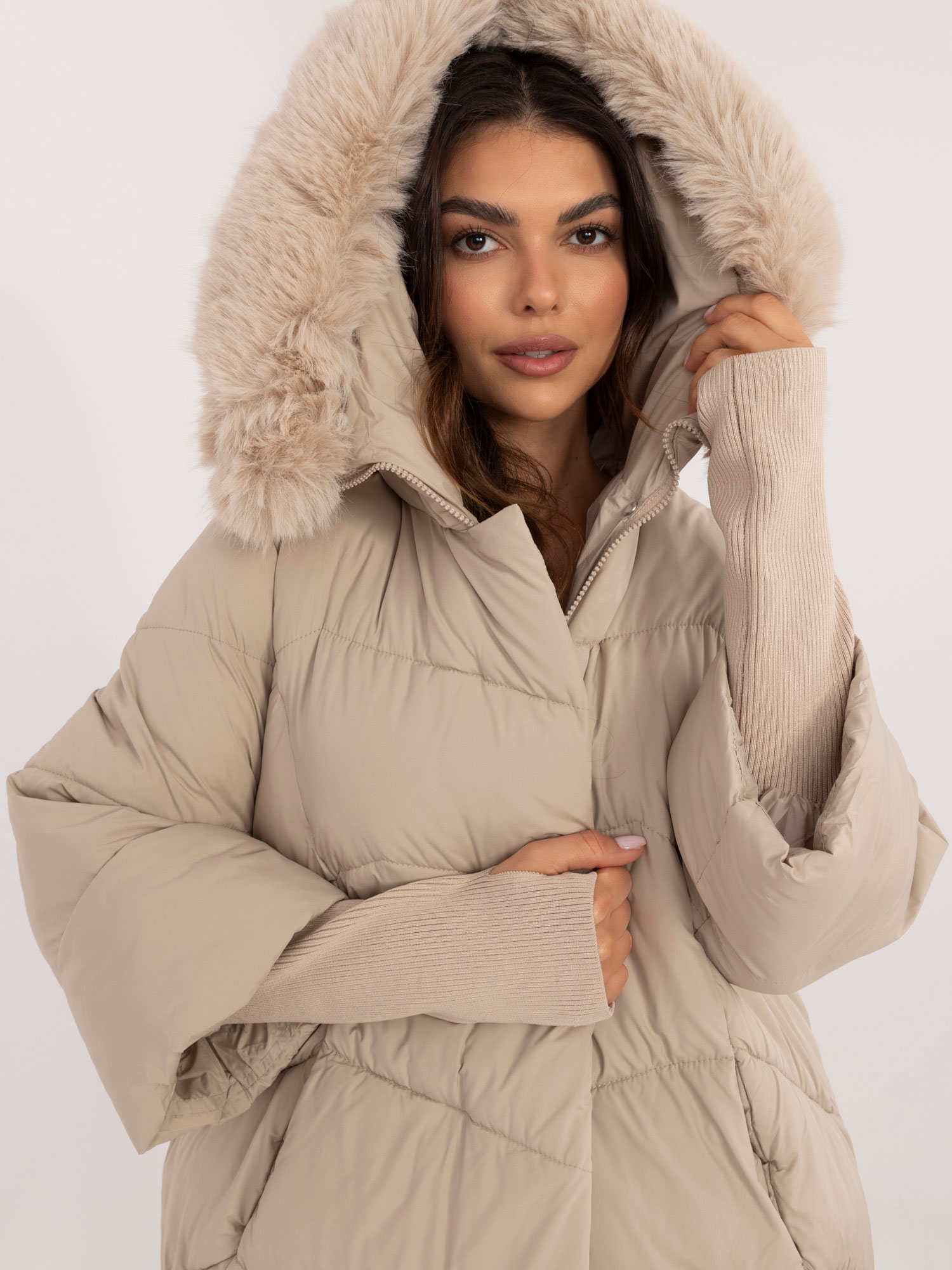 Beige winter jacket with long cuffs