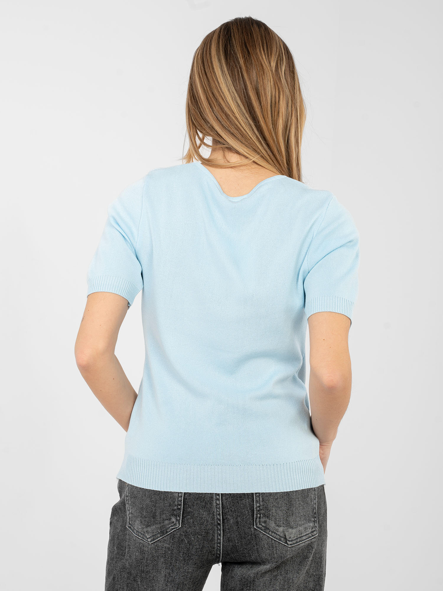 Světle modrý svetr