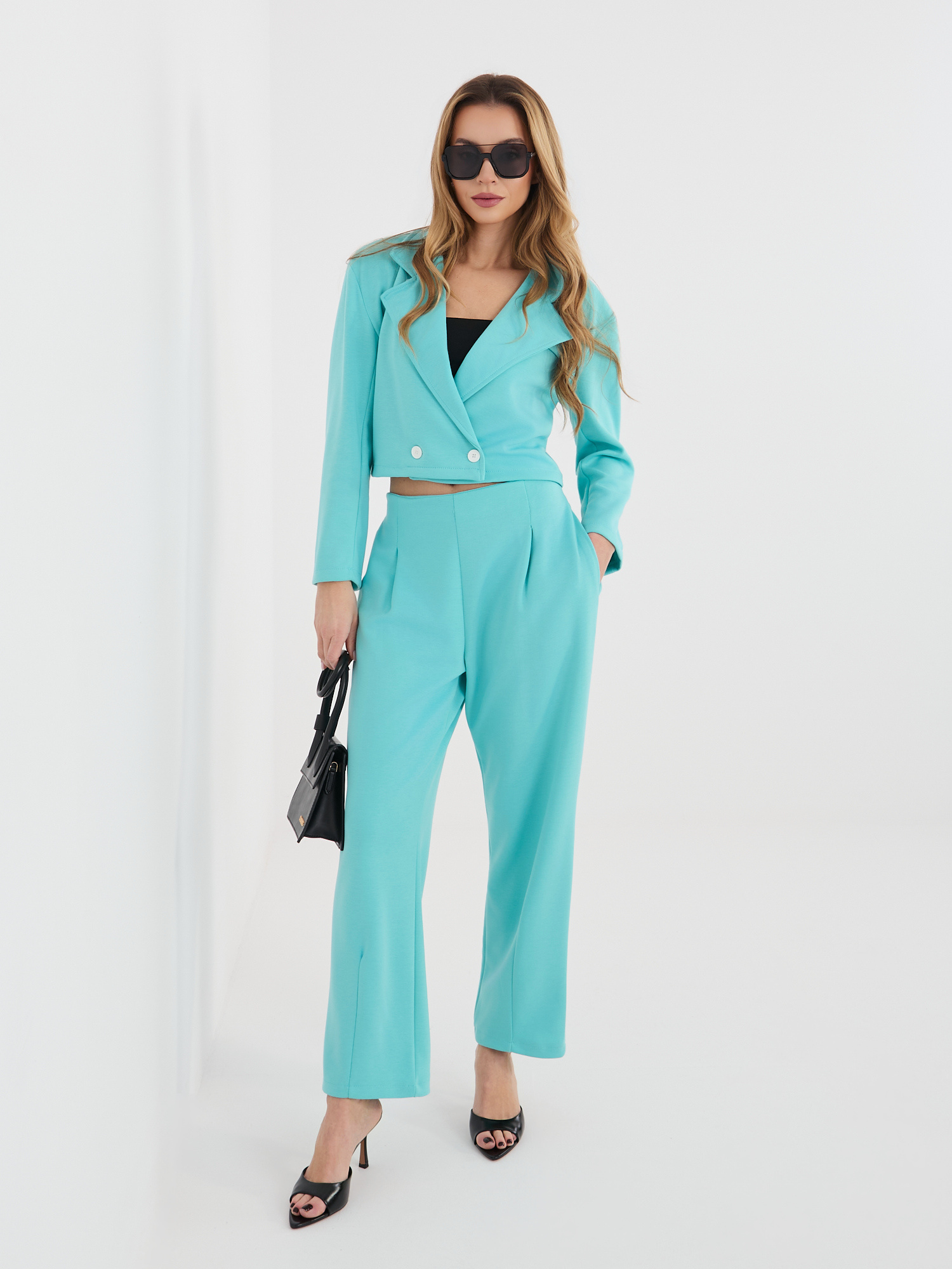 Тюркоазен комплект от трикотаж с плисирани панталони