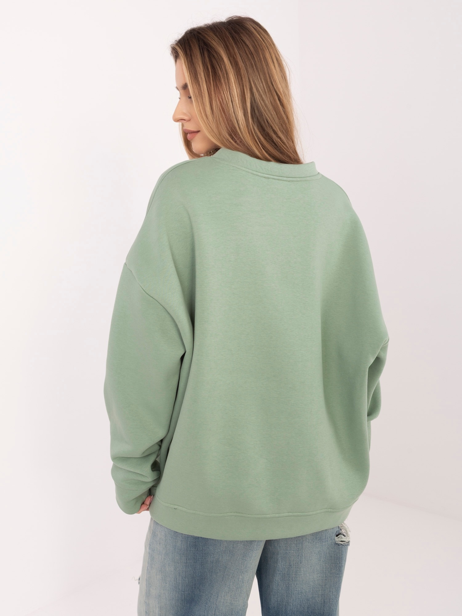 Oversize pistáciová mikina s výšivkou