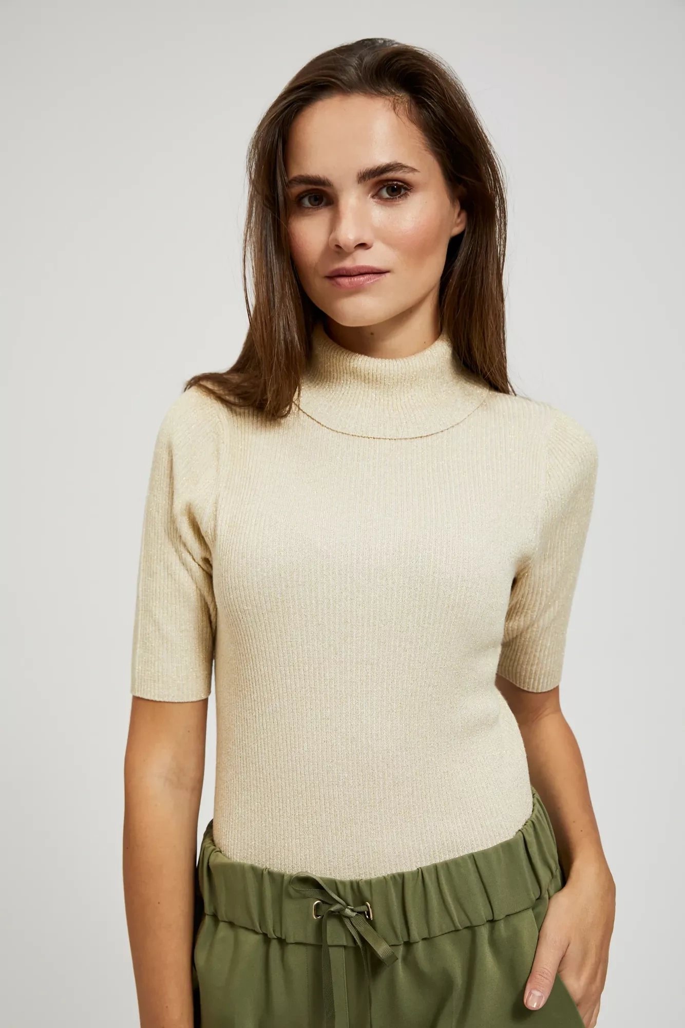 Turtleneck sweater decorated with metallic thread