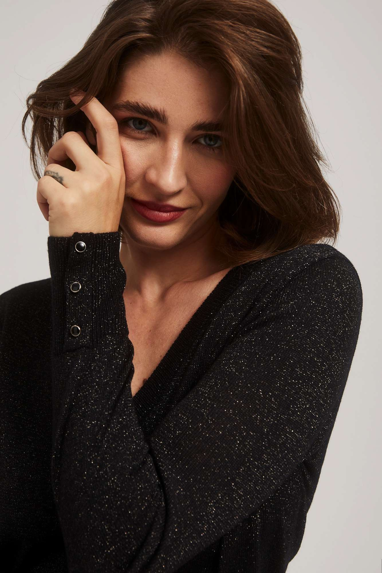 Sweater with metal thread and V-neck