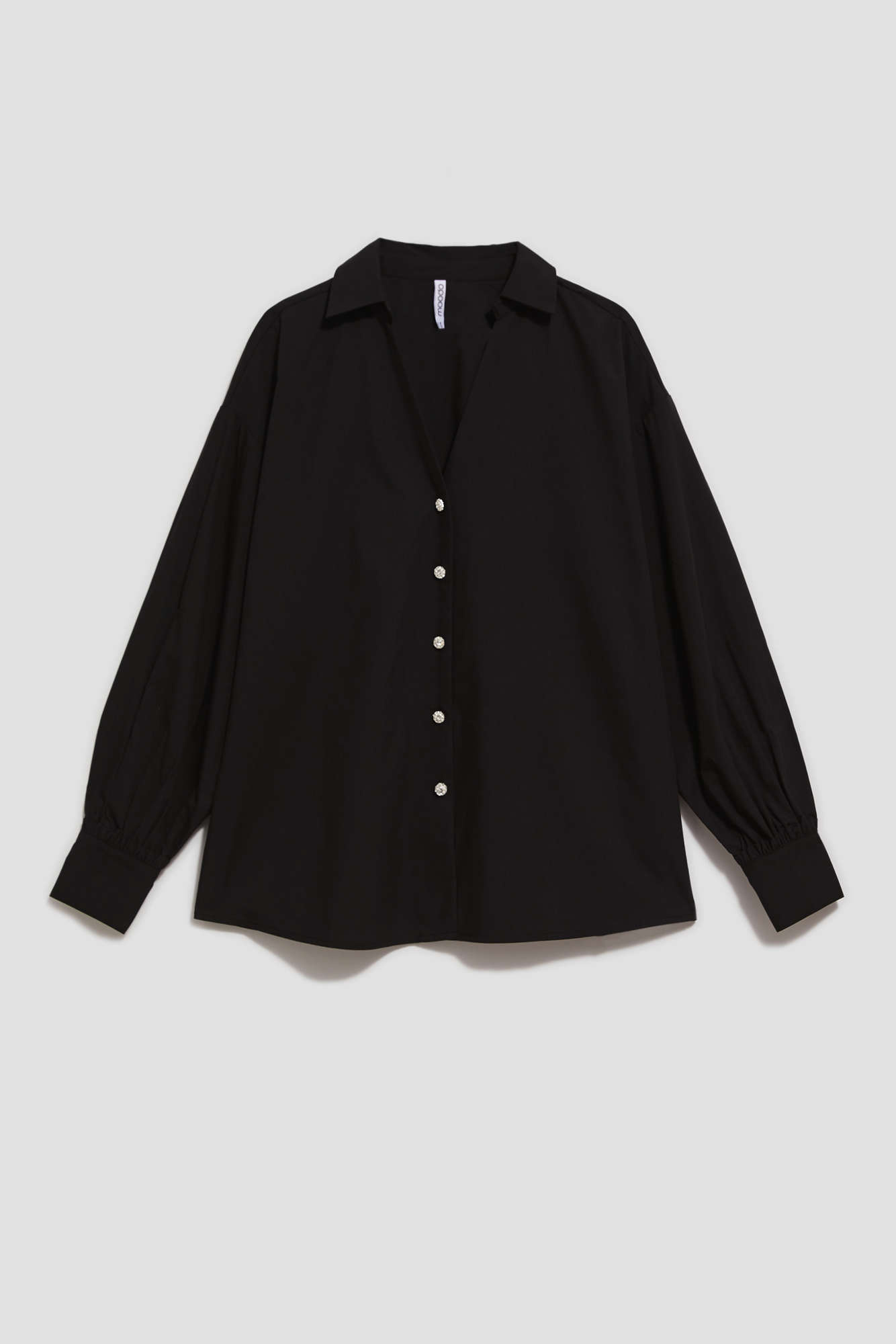 Shirt with decorative buttons