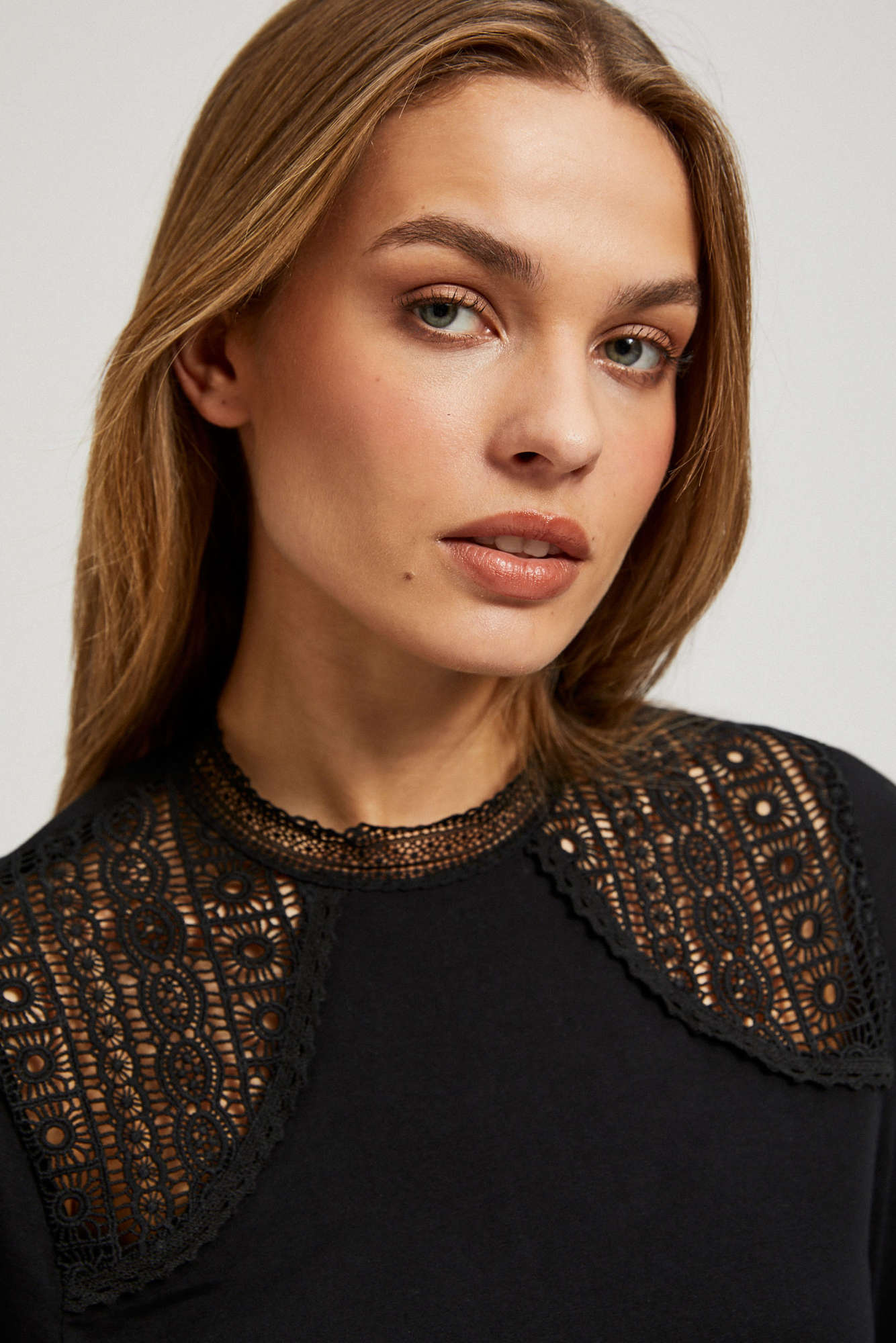 Blouse with decorative lace