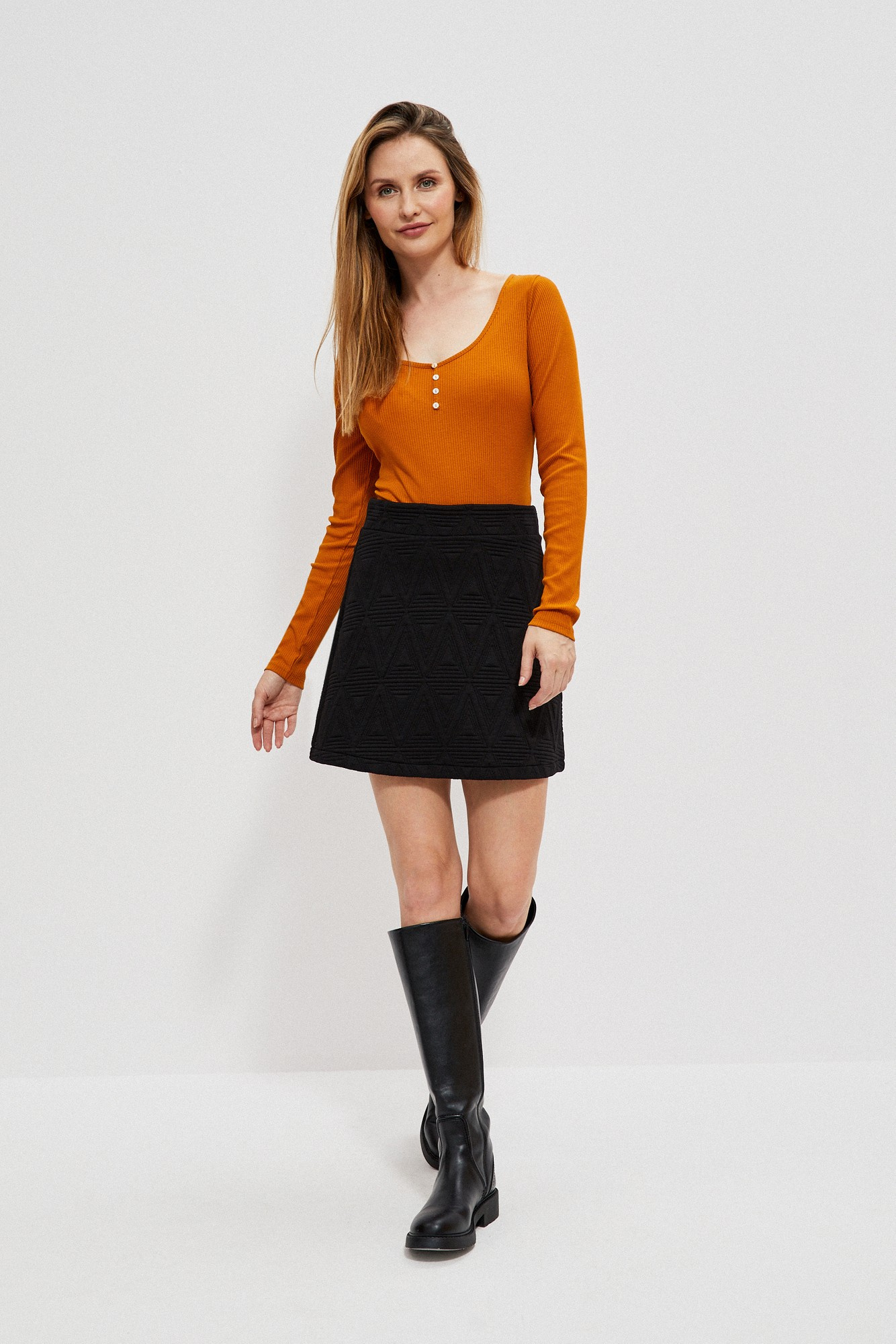 Mini skirt with geometric embossing