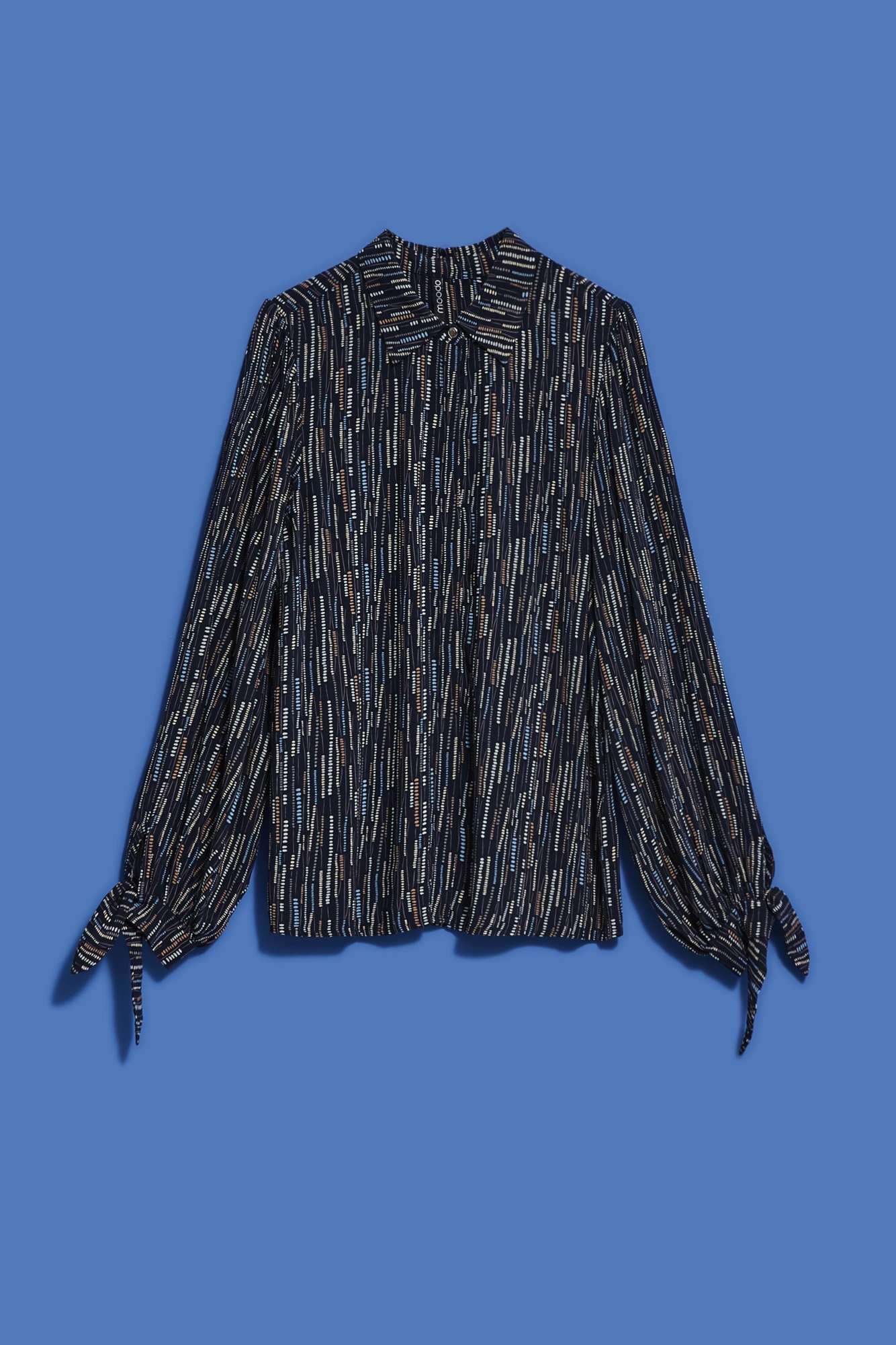 Women's shirt with tie on the sleeves