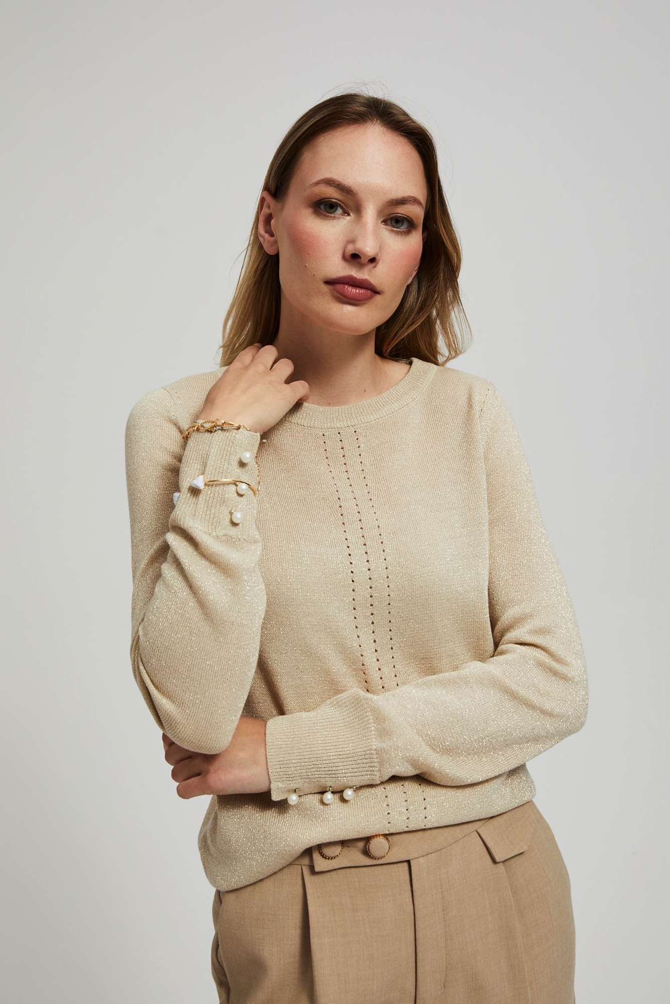 Sweater with openwork decoration