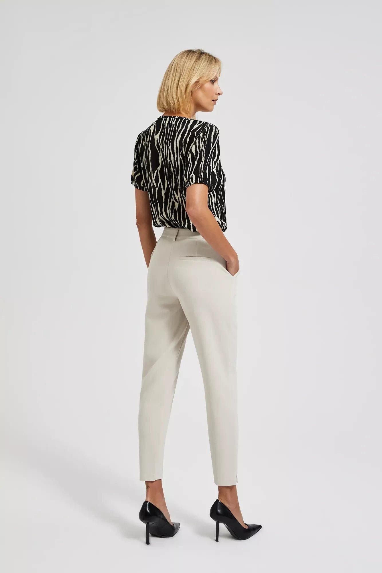 Elegant women's trousers in beige color