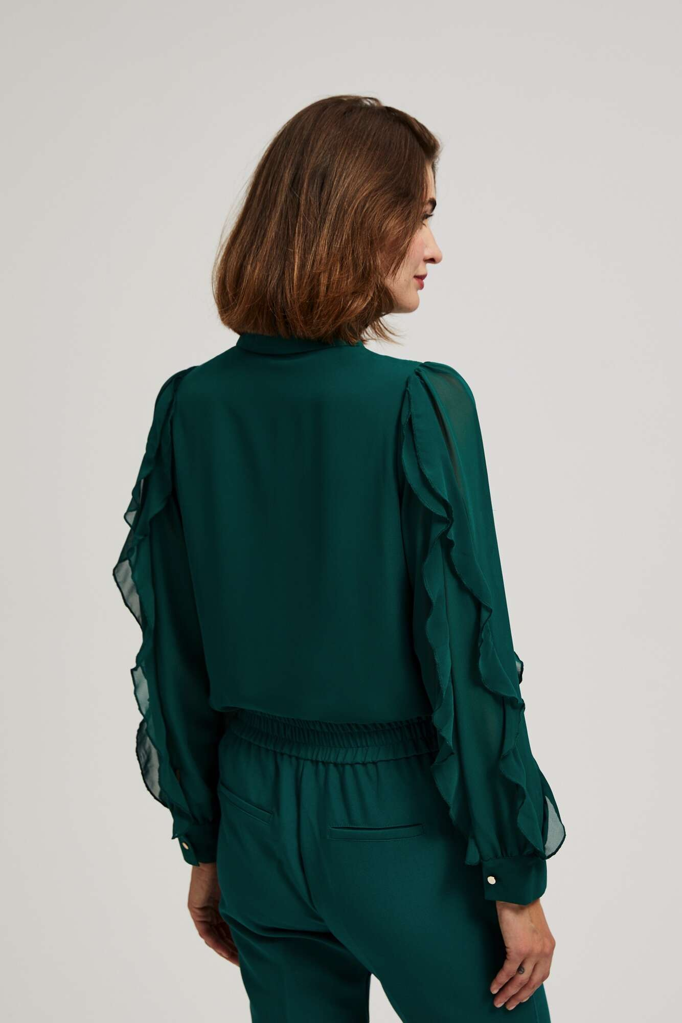 Shirt with ruffles on the sleeves
