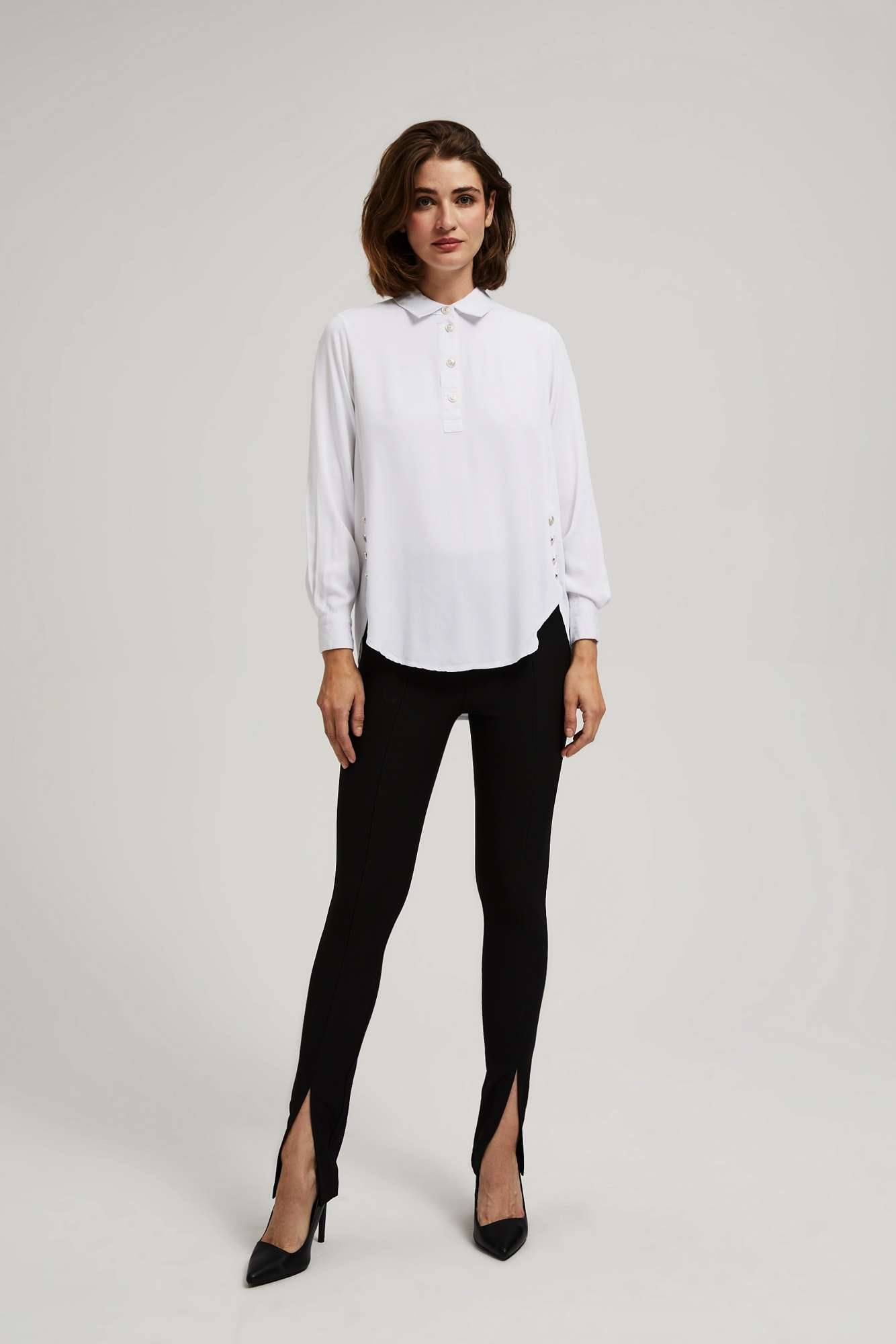 Shirt with decorative buttons