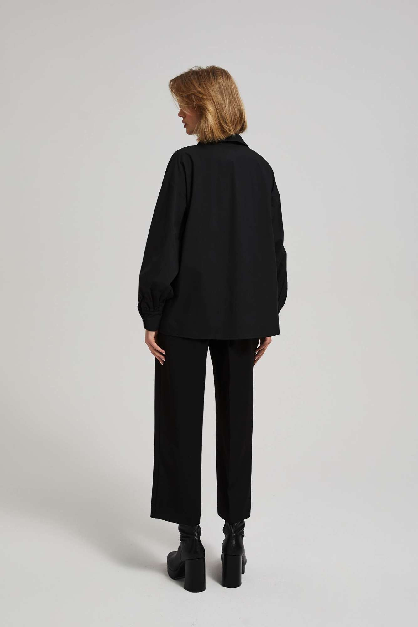 Shirt with decorative buttons