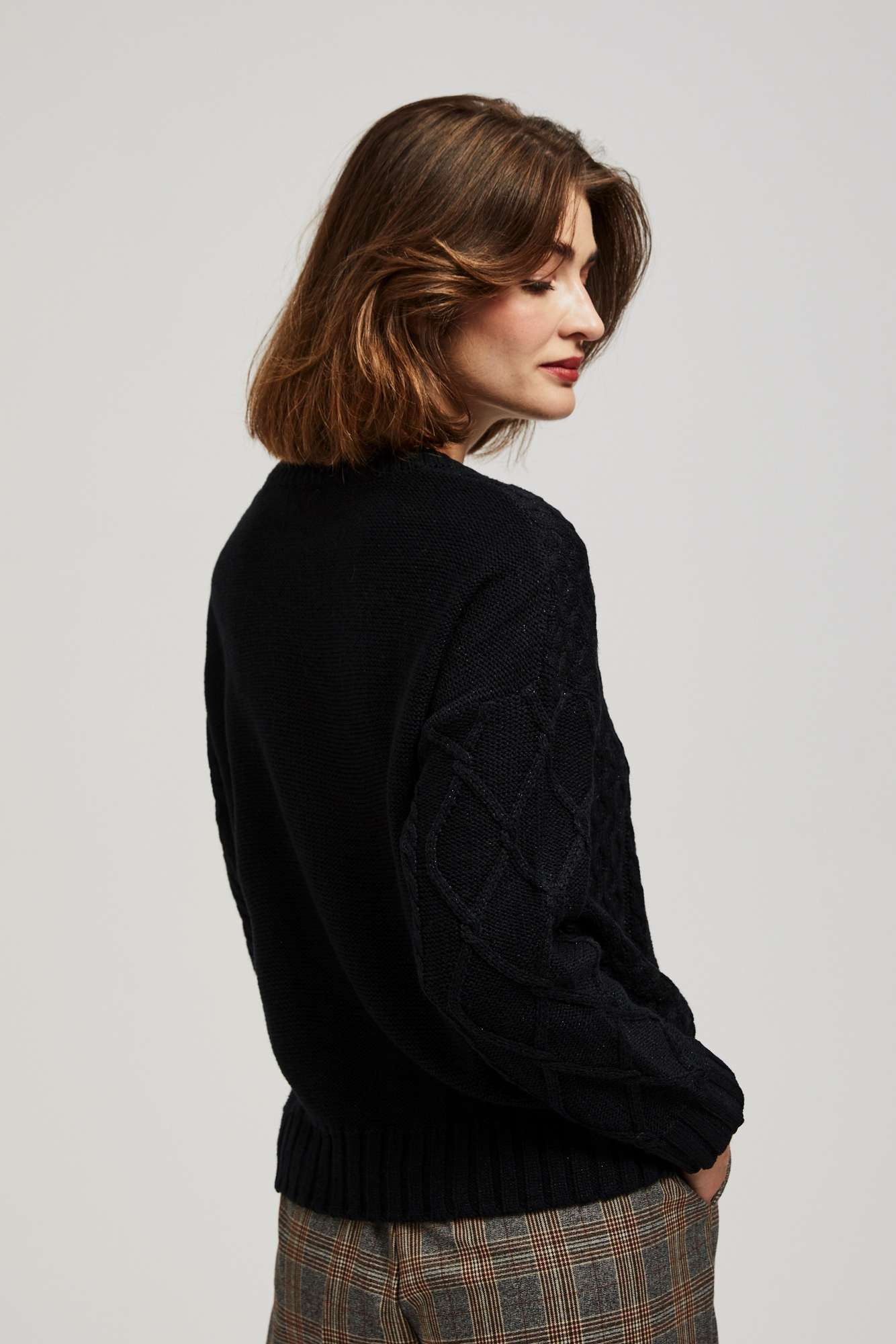 Sweater with decorative fabric