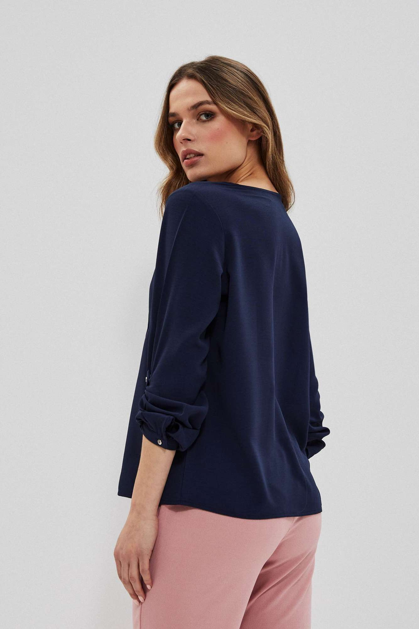 Shirt with decorative buttons