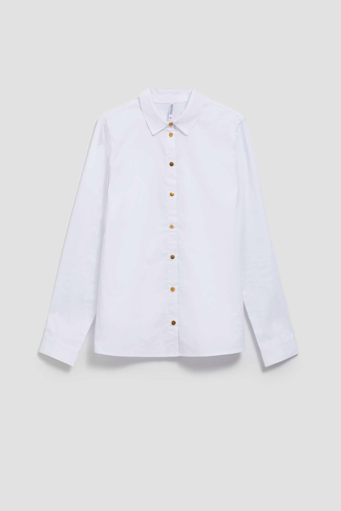 Plain shirt with decorative buttons