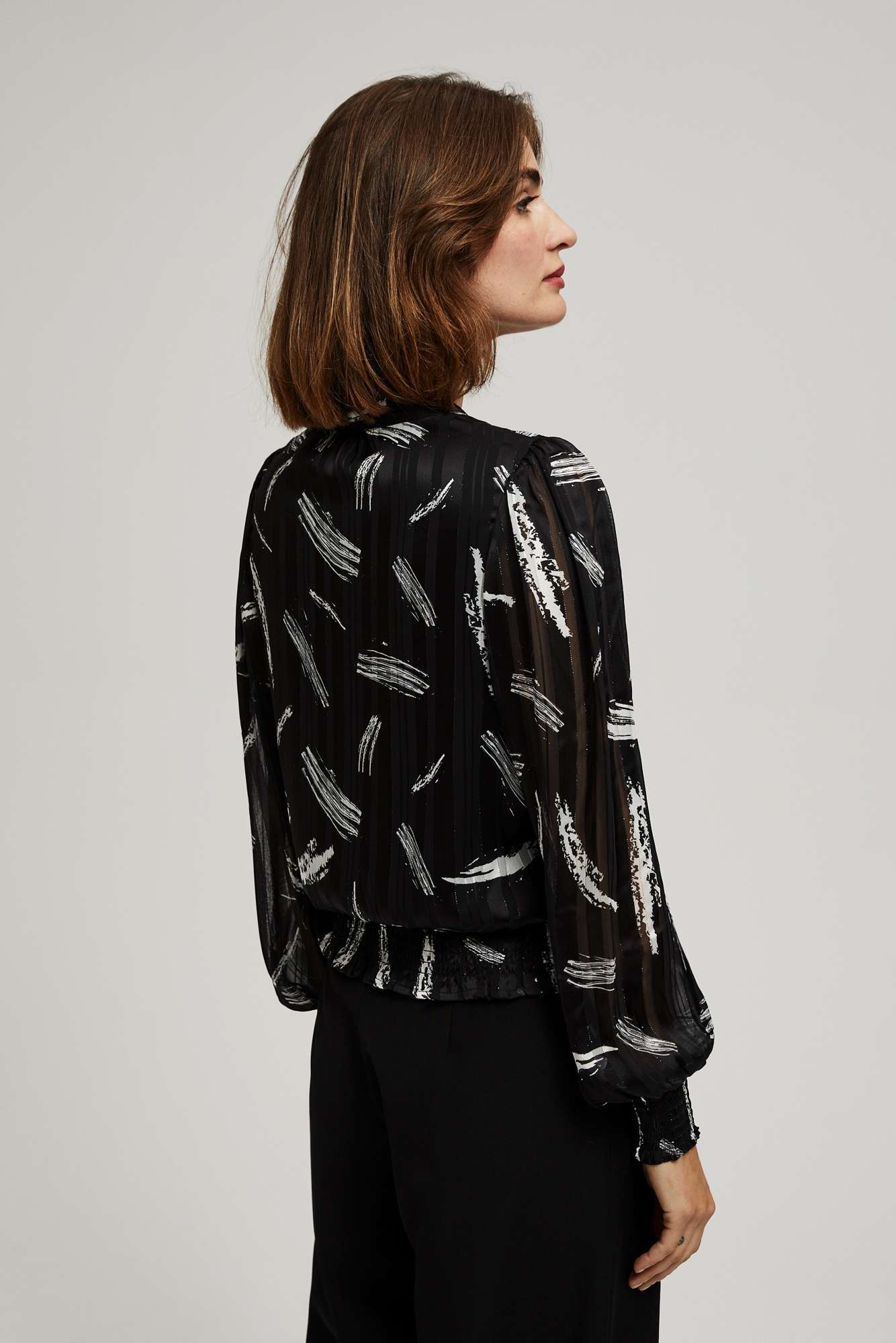 Shirt with a tied neckline