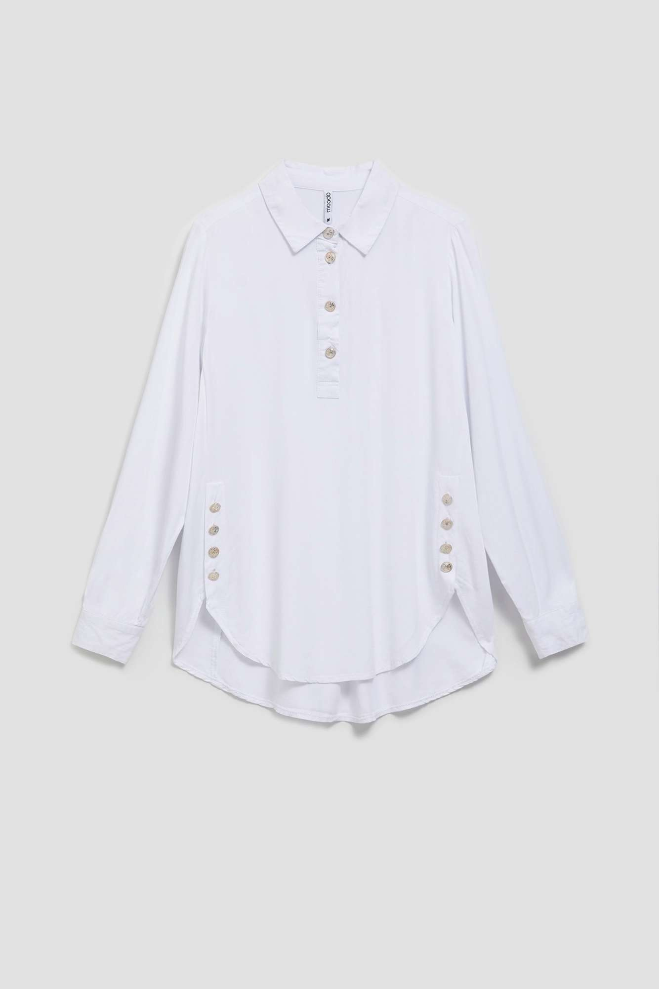 Shirt with decorative buttons