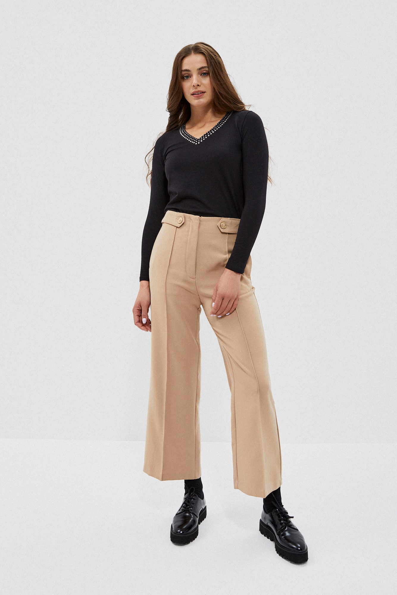 Plain blouse with a decorative neckline