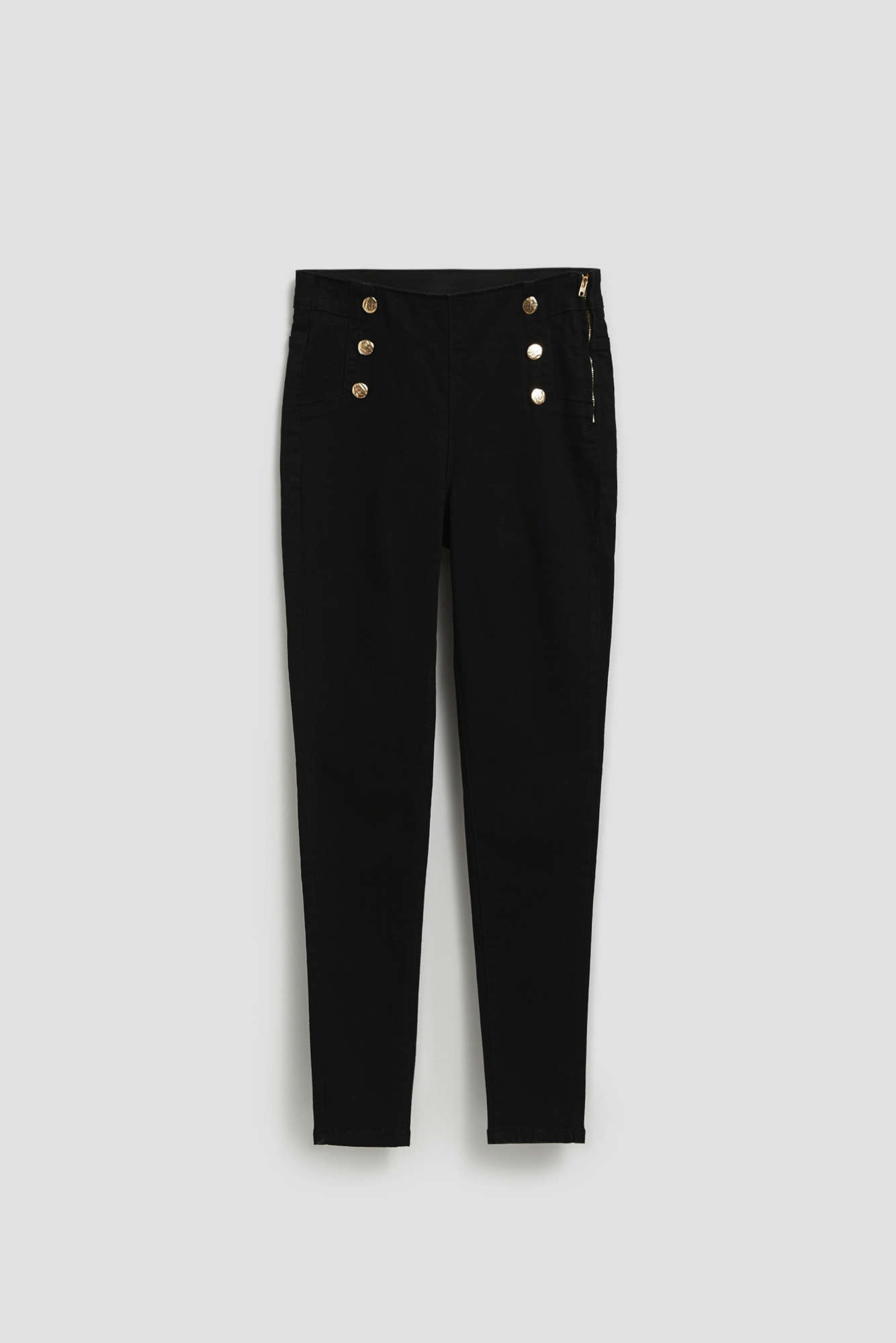 Jeans with decorative buttons