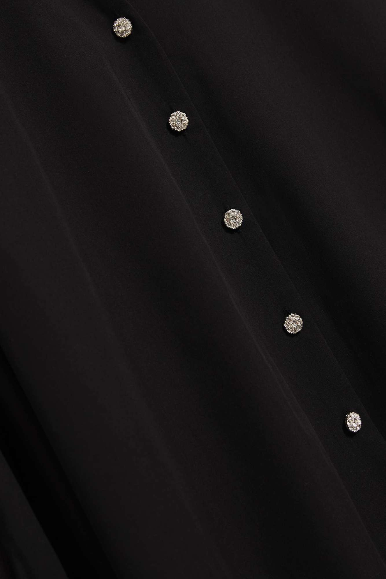 Shirt with decorative buttons