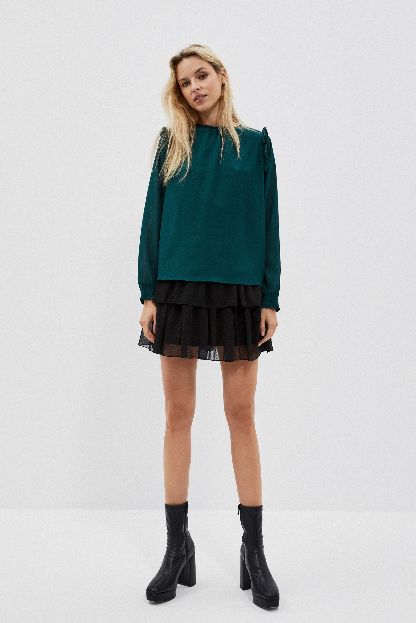 Shirt with ruffles on the shoulders