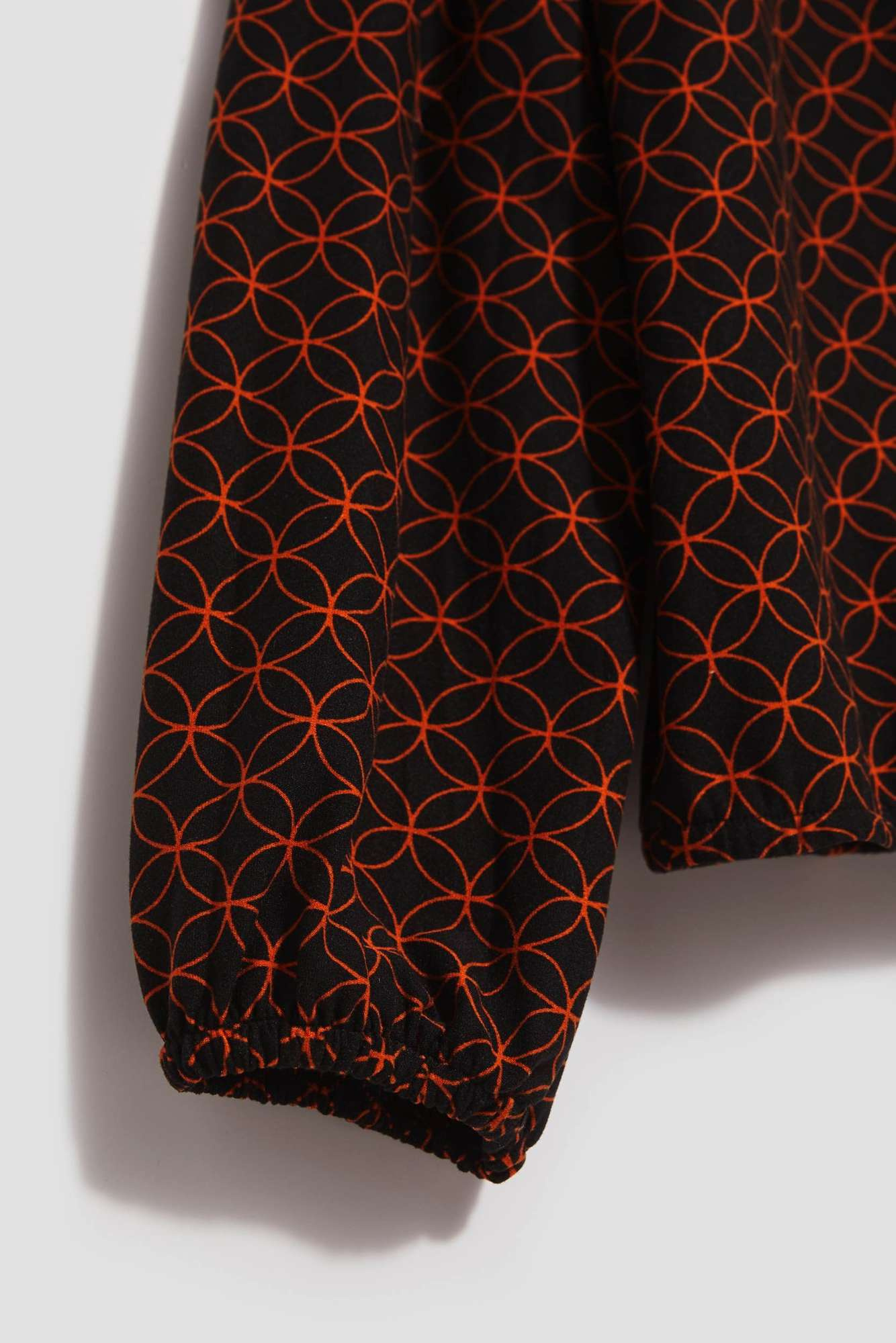 Blouse with a geometric pattern