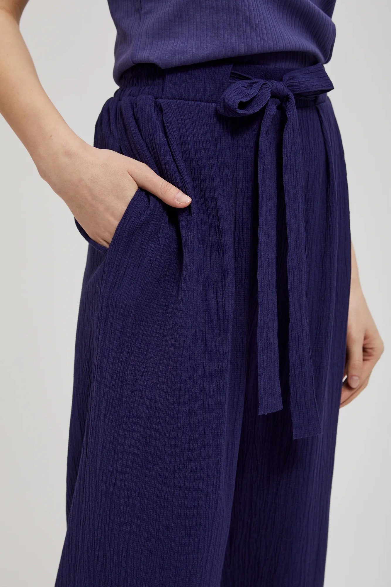 Women's wide trousers with ties MOODO - purple