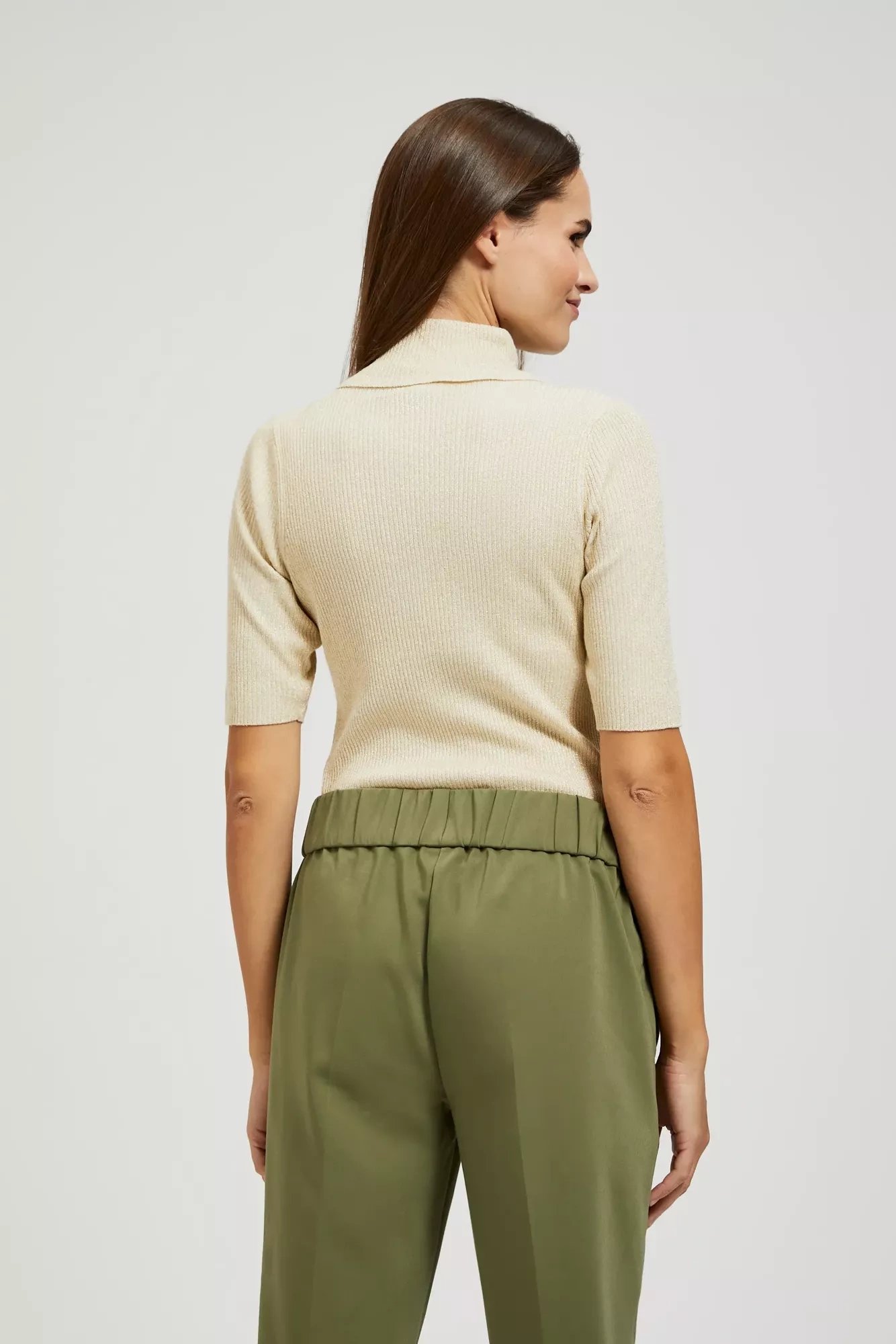 Turtleneck sweater decorated with metallic thread