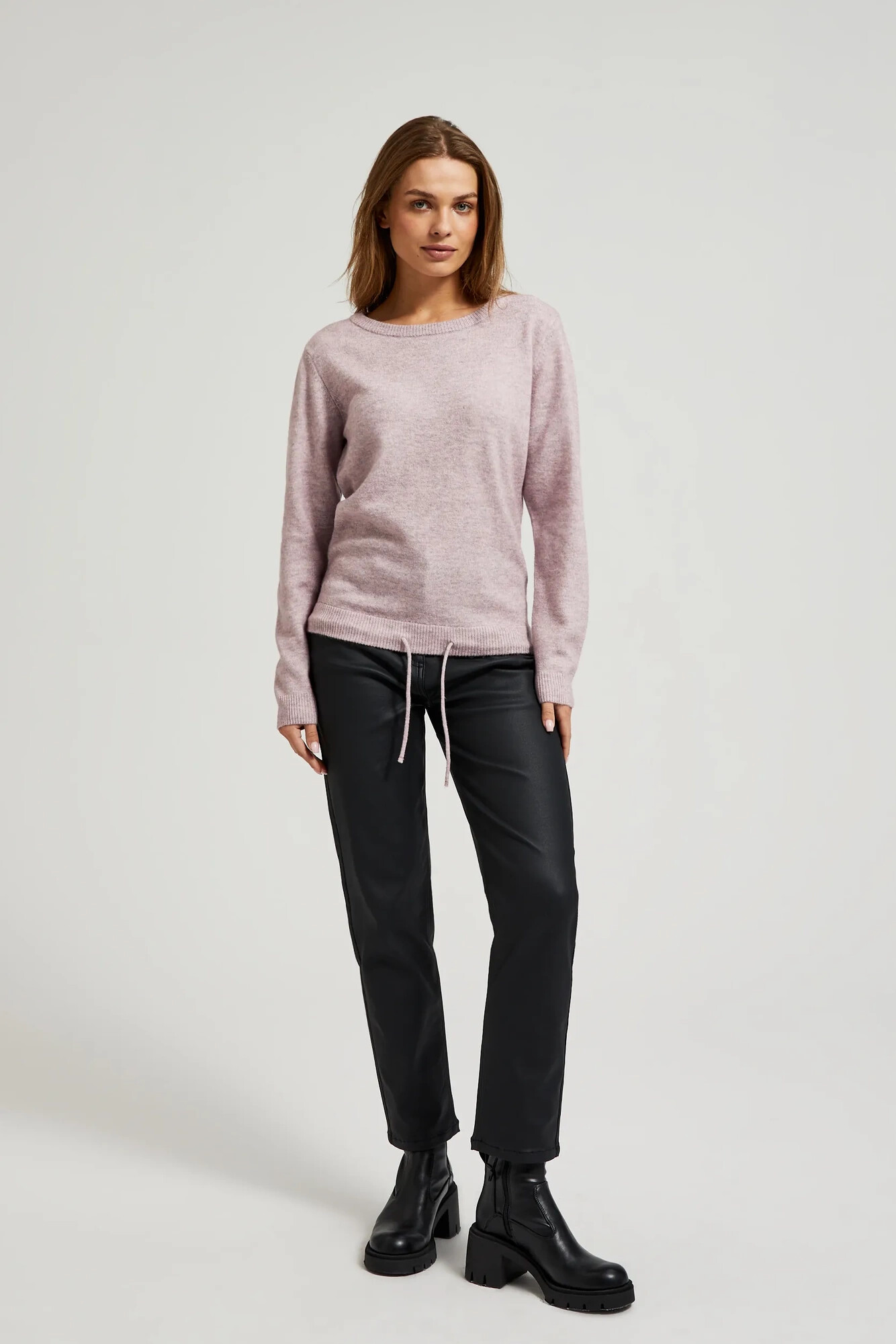Pink sweater with a round neckline and waist tie