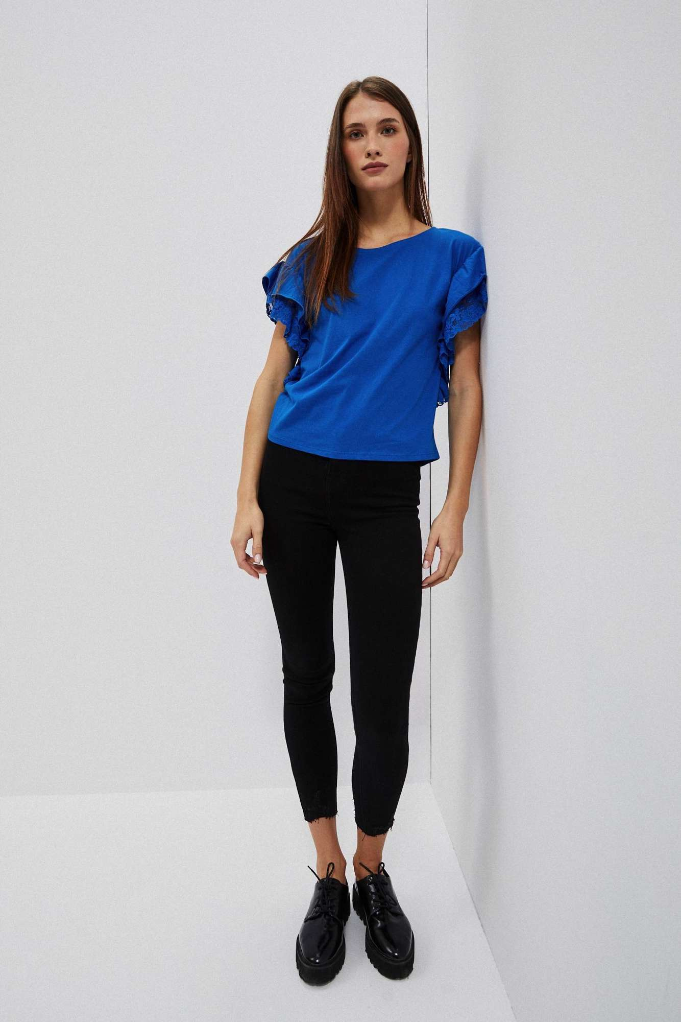 Blouse with ruffles on the shoulders