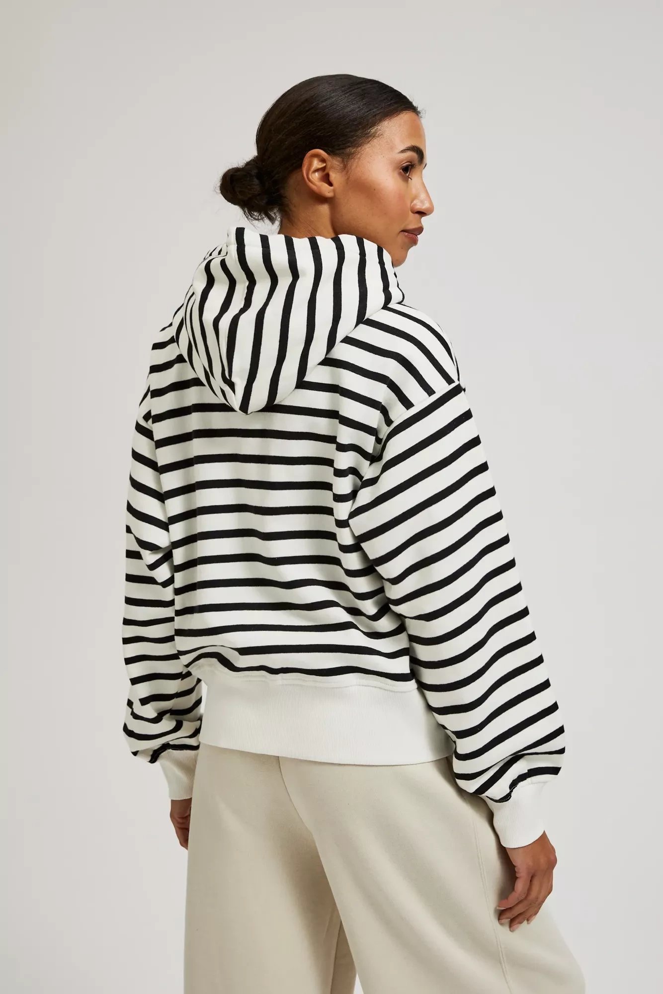 White sweatshirt with black stripes
